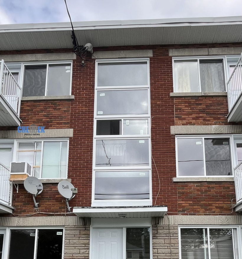 Apartment building windows after replacement