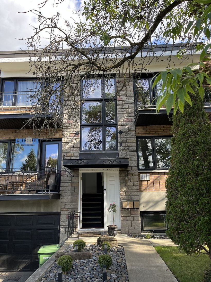 Building front with new black windows