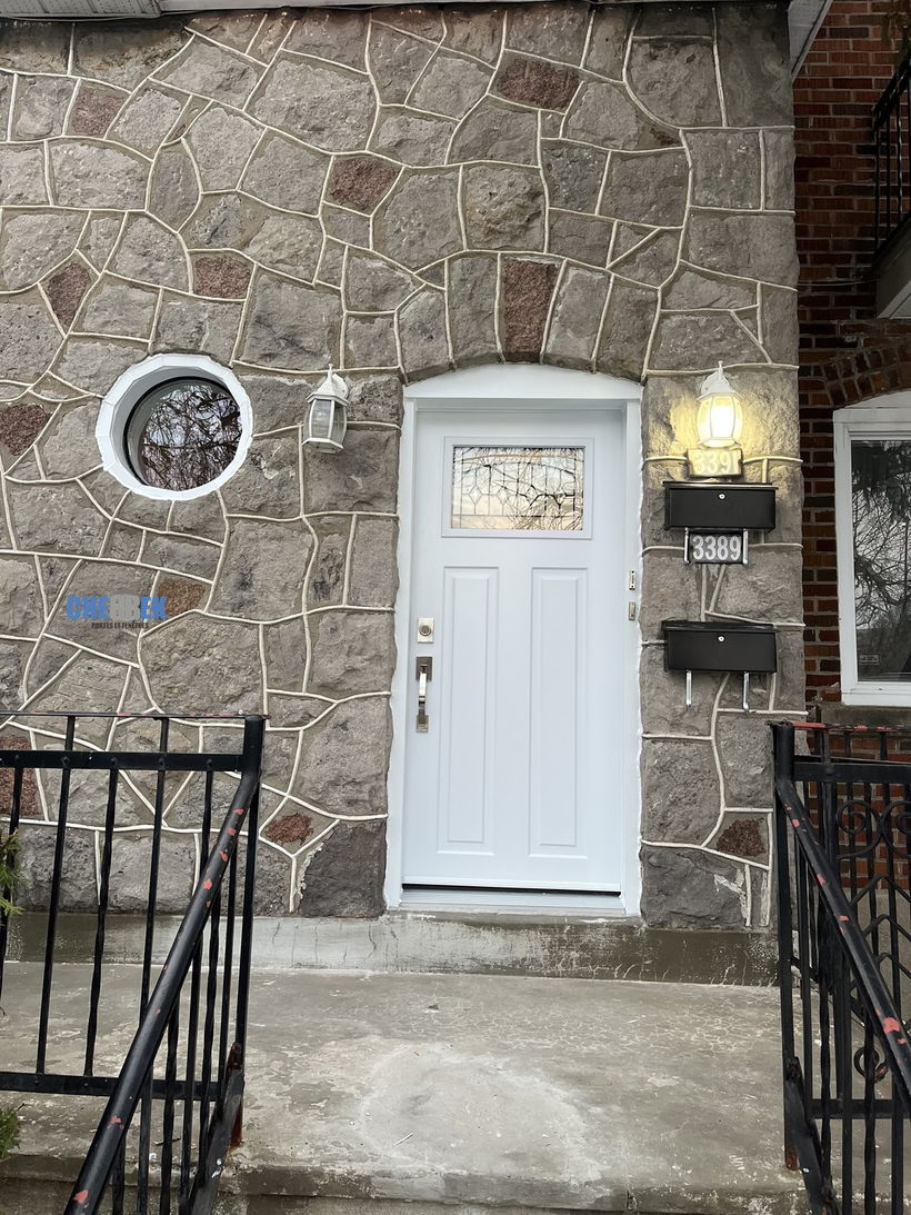 New white entry door after installation